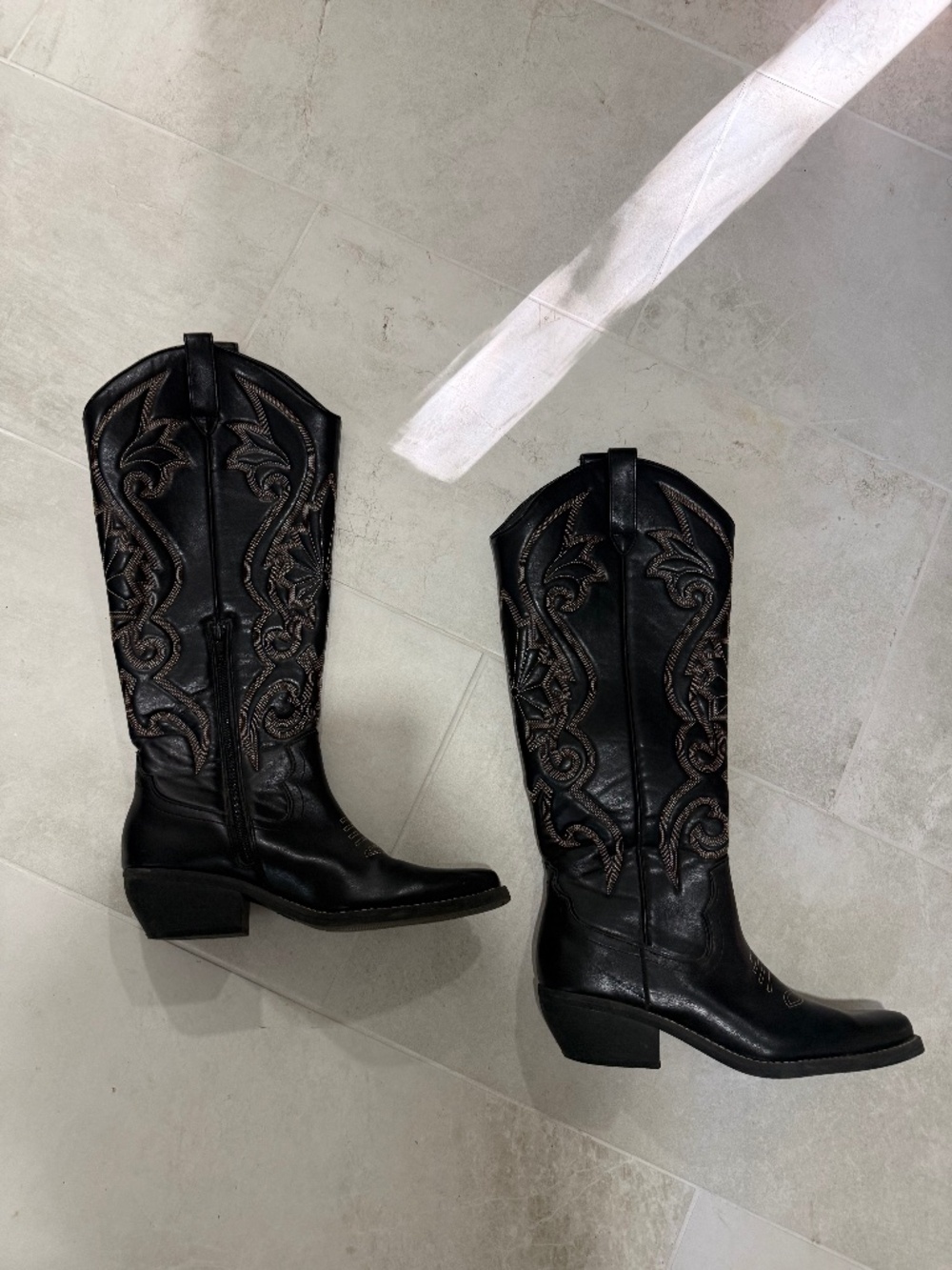 Black and brown cowboy boots